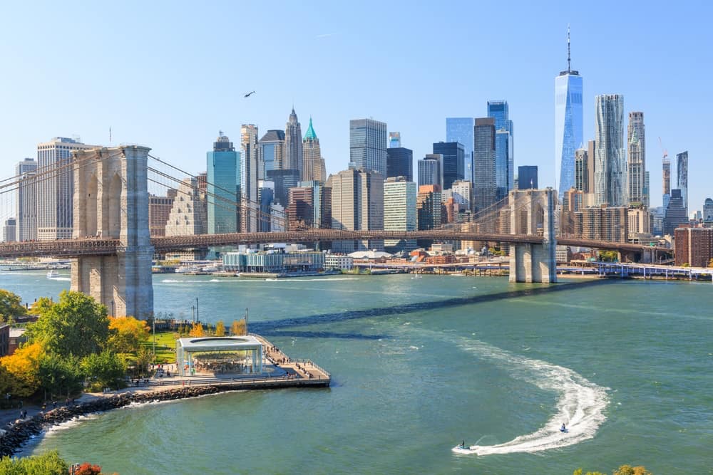 New York City skyline with Manhattan skyscrapers and bridge on clear day