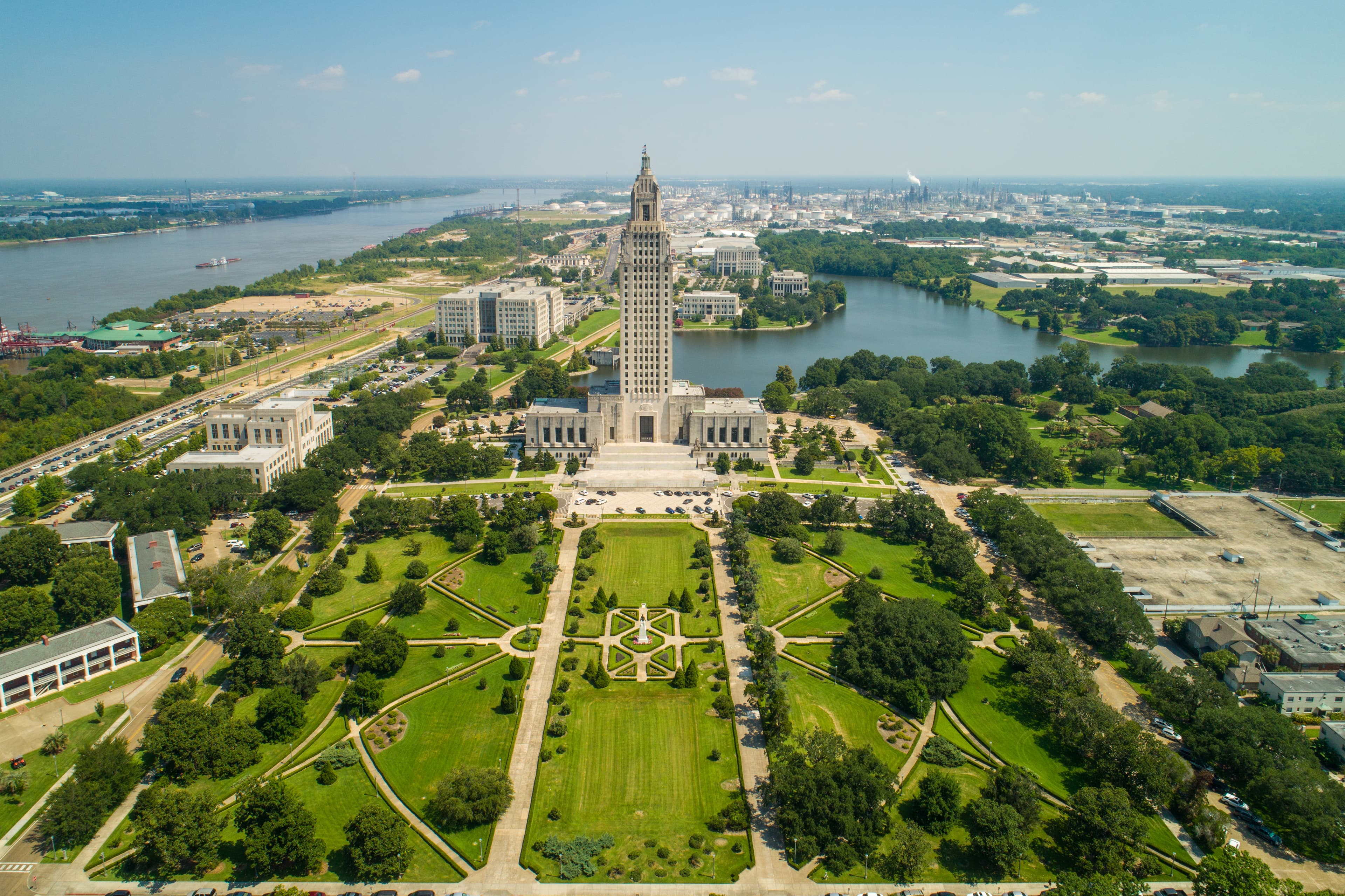 Aerial view of Baton Rouge, LA, during the daytime, featuring blue skies.