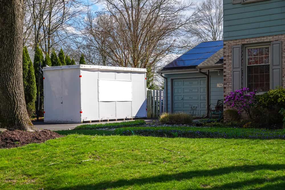 Portable storage container in a driveway