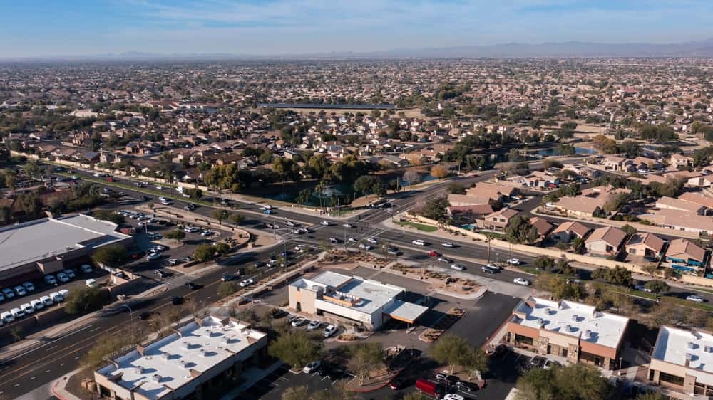 Aerial view of Surprise, Arizona, showing suburban neighborhoods and major roadways.