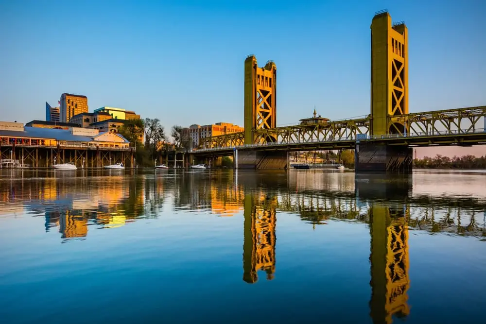 Skyline of Sacramento, CA over the water at dusk
