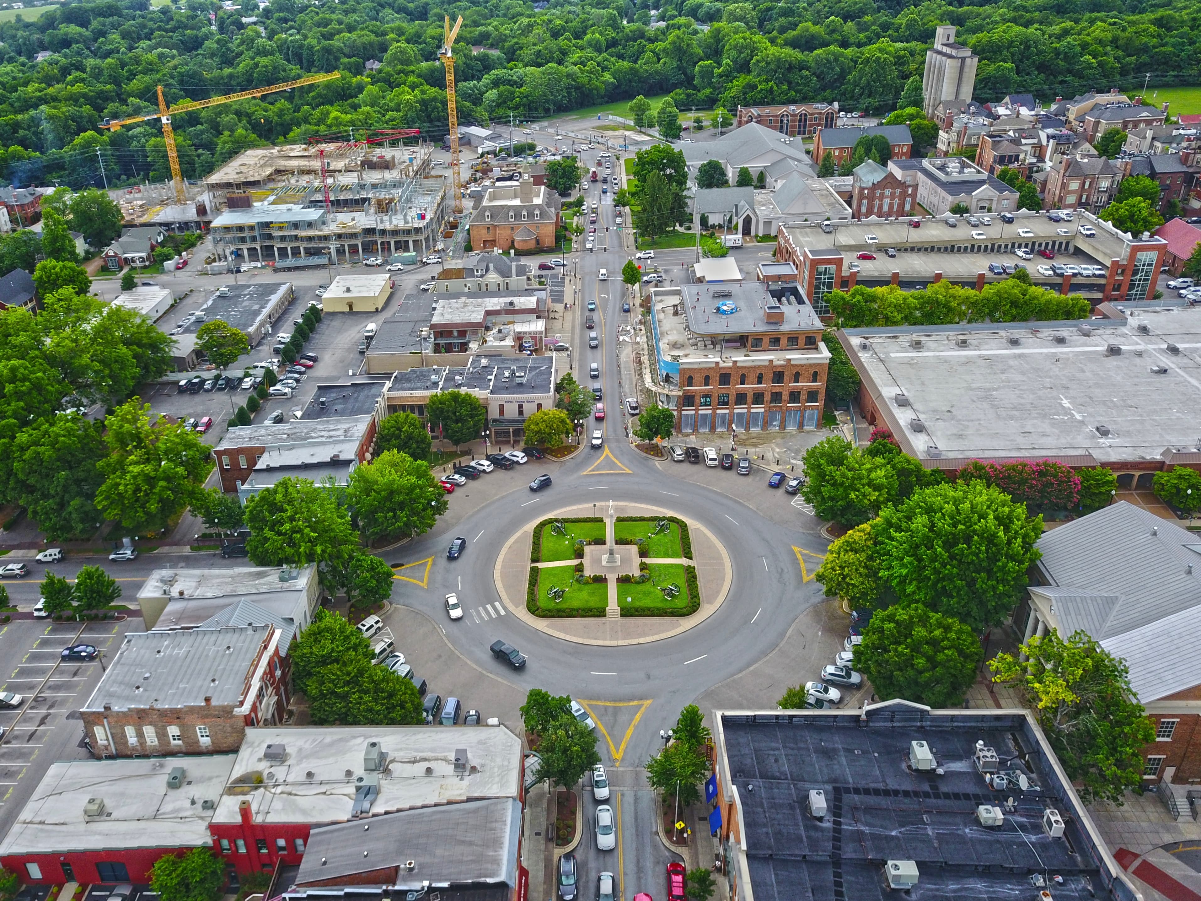 Overhead view of a roundabout surrounded by buildings and trees in Franklin, TN