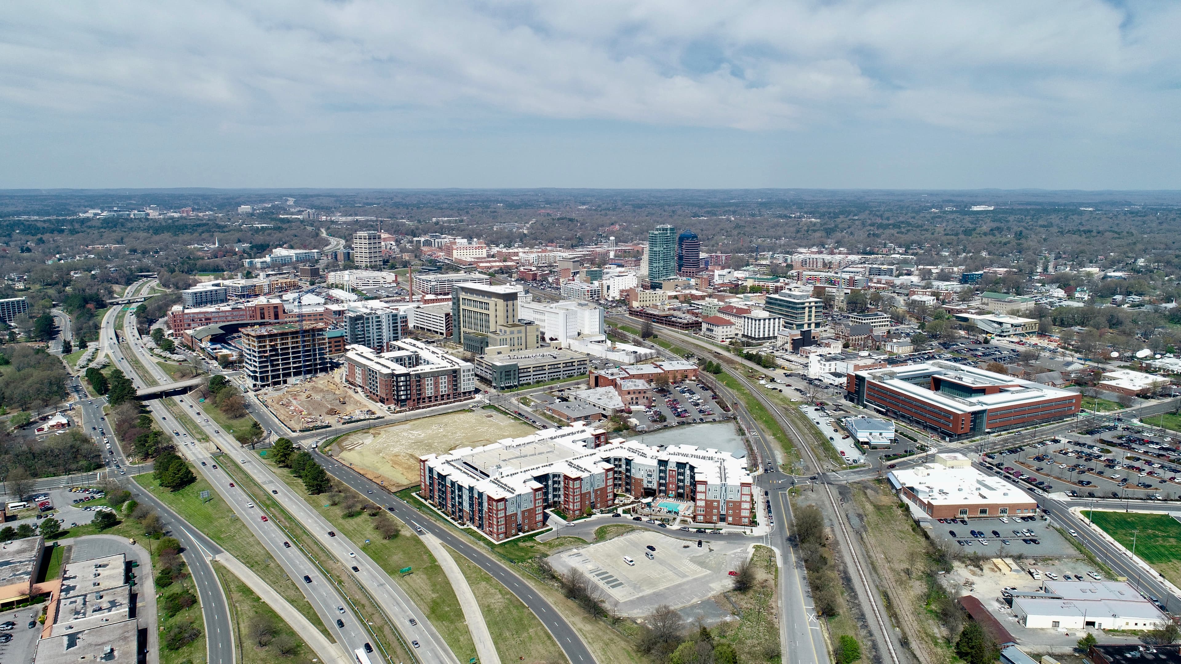 Overhead photo of Durham, NC's skyline on a cloudy day