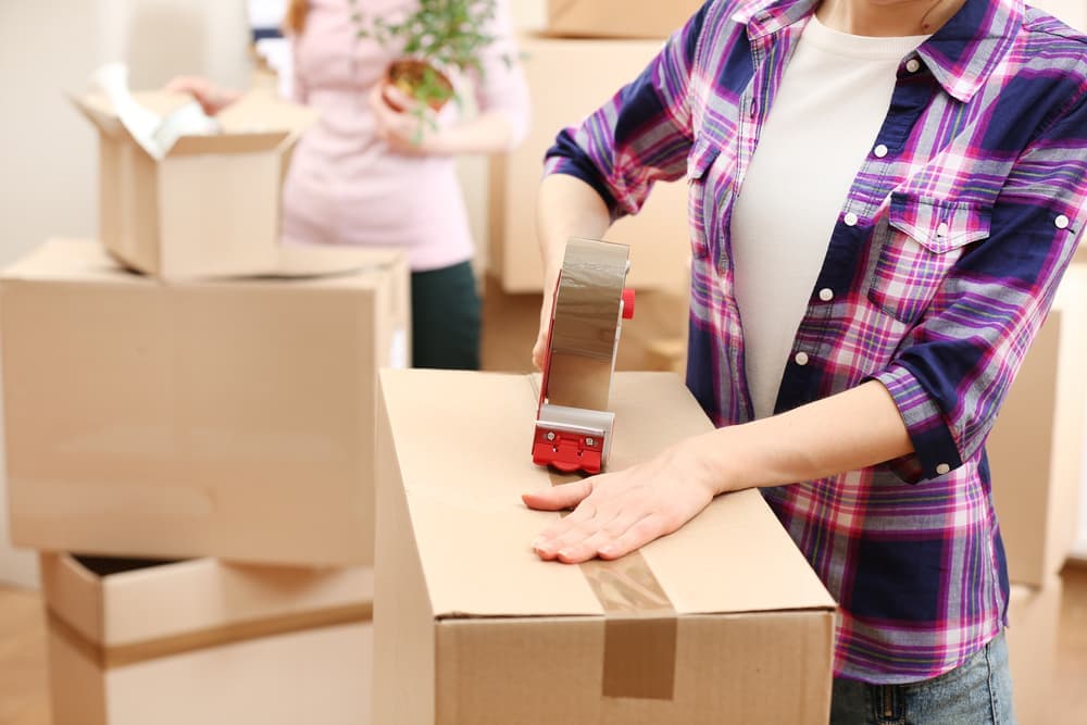 Taping up boxes with packing tape