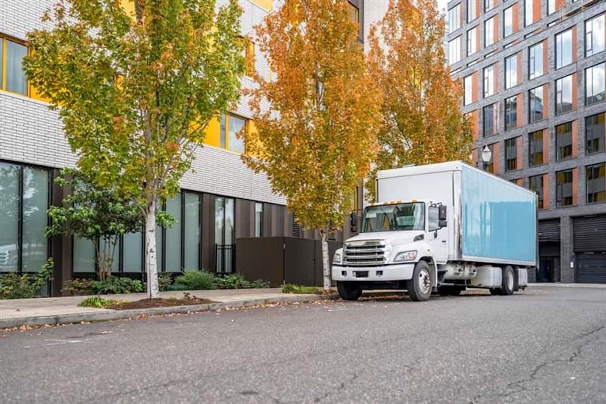Moving truck at an apartment building