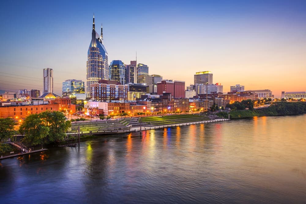 Skyline view of Nashville, TN over the water.