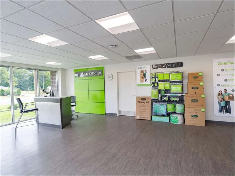 Moving boxes and supplies store inside Indianapolis, IN Extra Space Storage facility office.