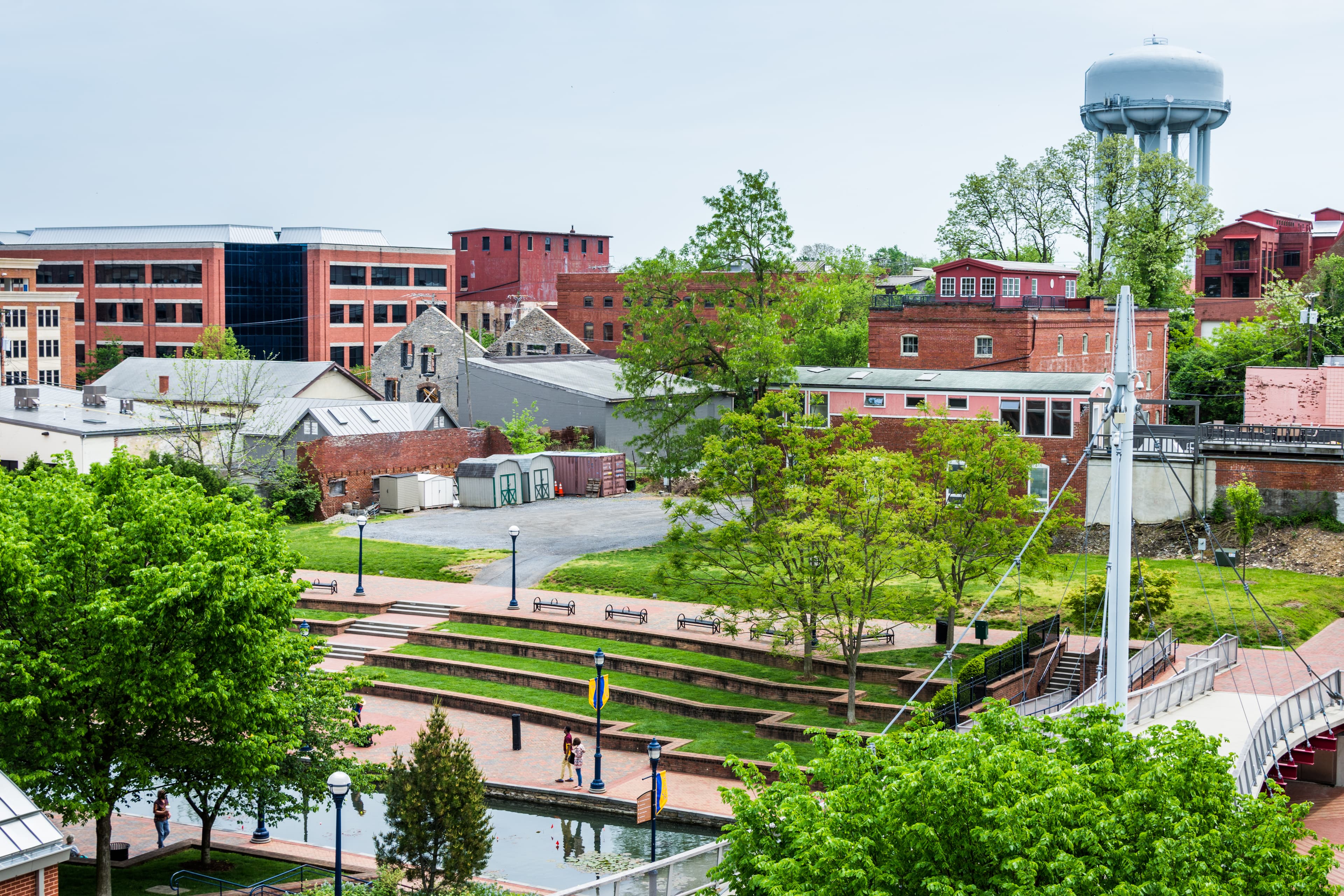 Image of a downtown area of Frederick, Maryland during daytime with cloudless skies.