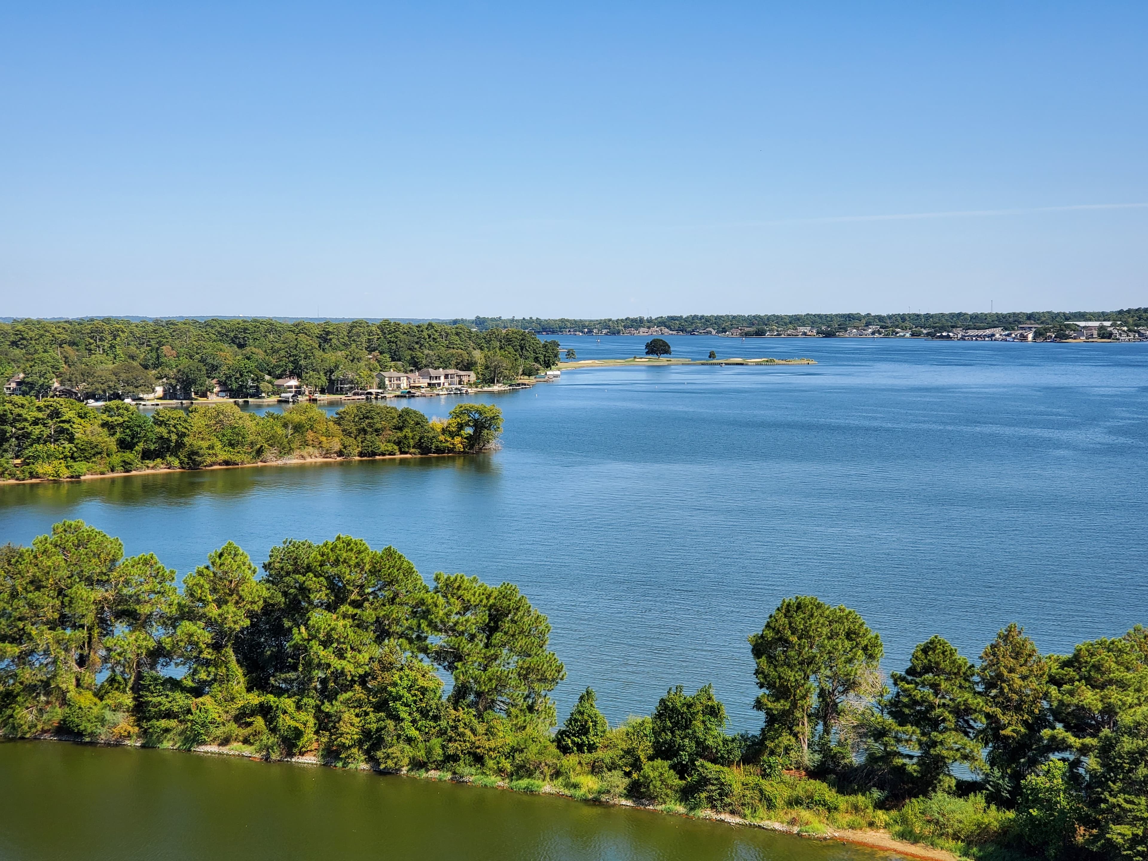 A daytime view of a lake in Conroe, Texas.