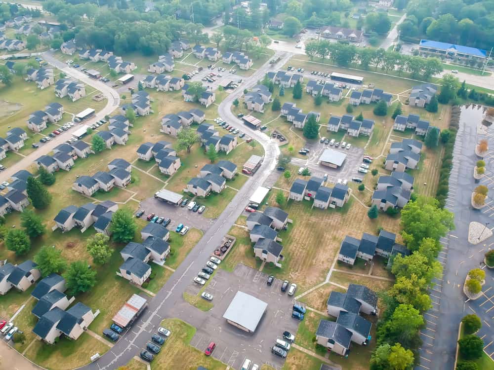 Aerial view of a suburban apartment and townhome community in Troy, Michigan.