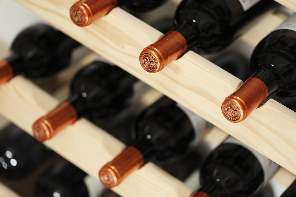 Bottles of wine on wooden wine rack