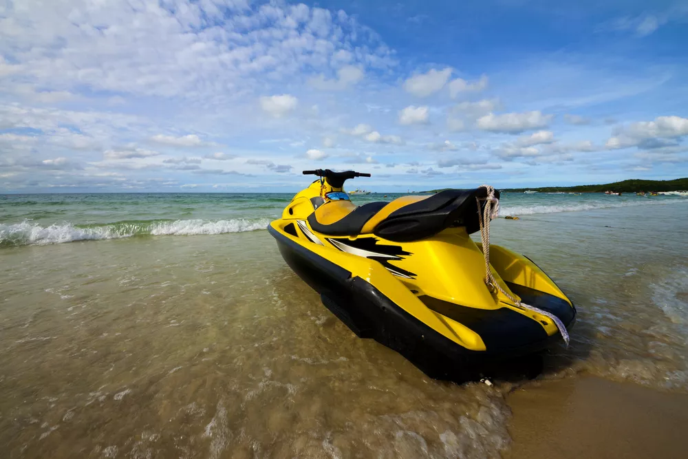 Jet ski sitting on beach