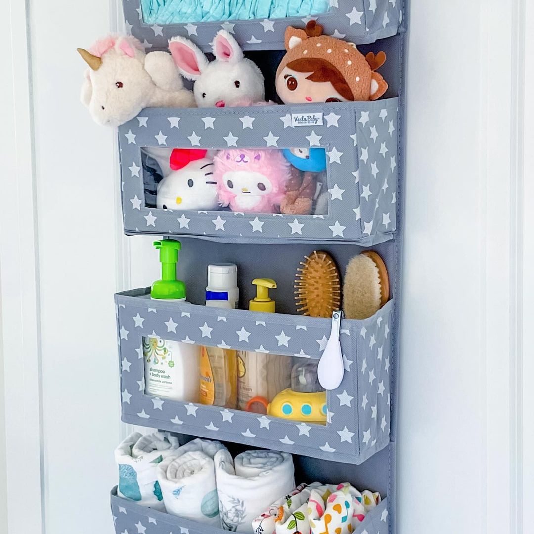 An over-the-door storage container filled with essential baby items. @vesta-baby