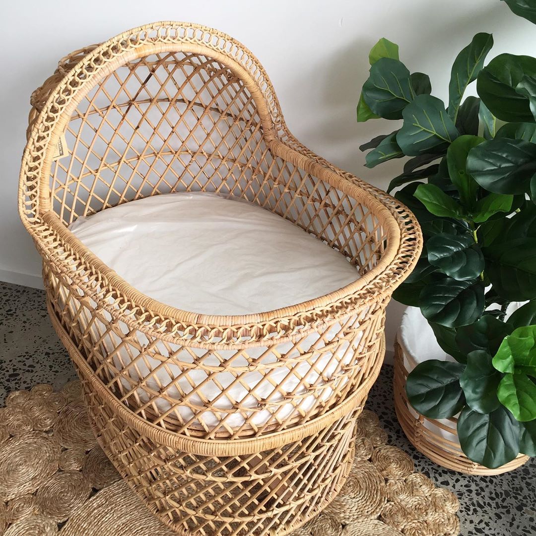 Rattan baby bassinet. Photo by Instagram user @therattancollective