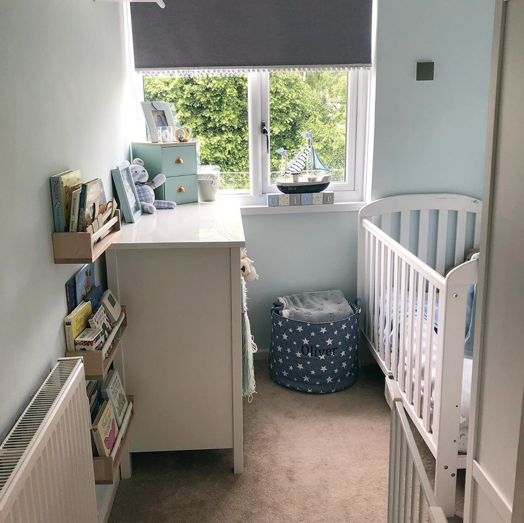Small baby nursery with crib and dresser. Photo by Instagram user @life.with.the.lakes