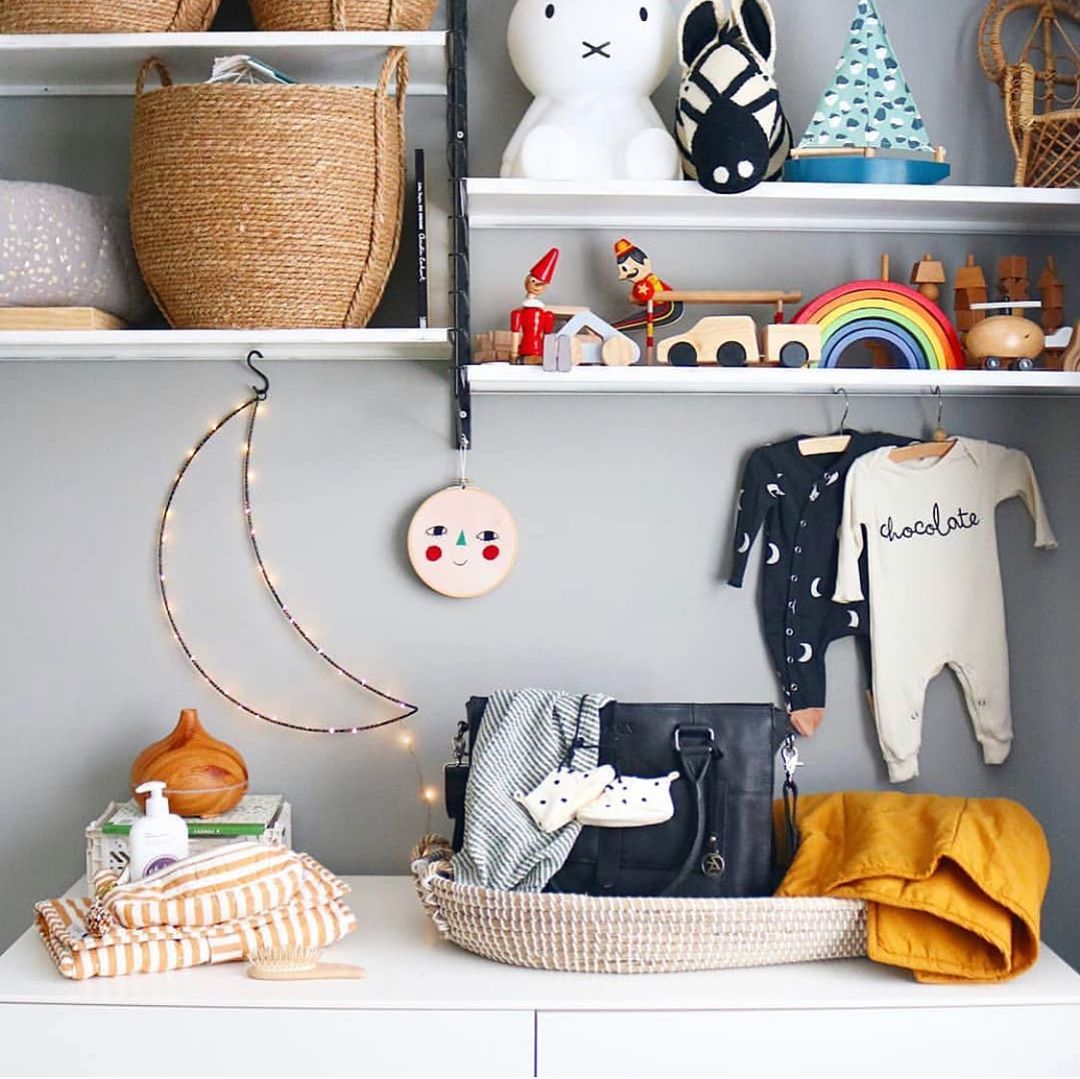Baby decor and storage on wall. Photo by Instagram user @littlebabycompany