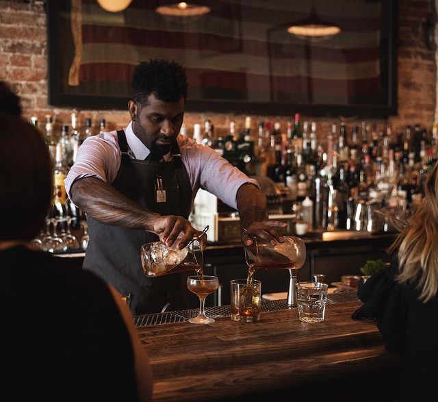 Bartender Serving Drinks at Union Lodge No. 1 in Denver. Photo by Instagram user @unionlodge1