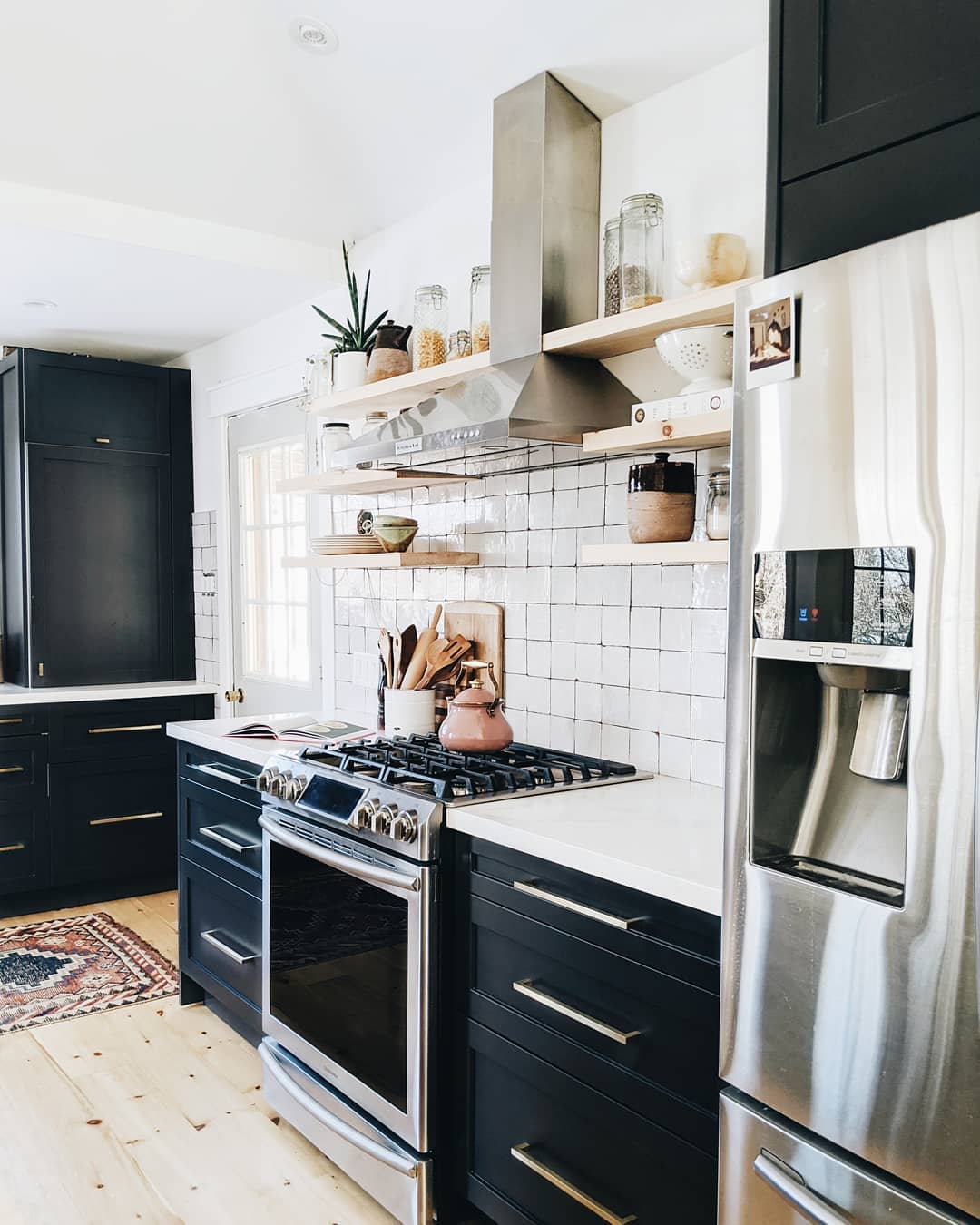 Kitchen with stainless steel appliances. Photo by Instagram user @kirsten.diane