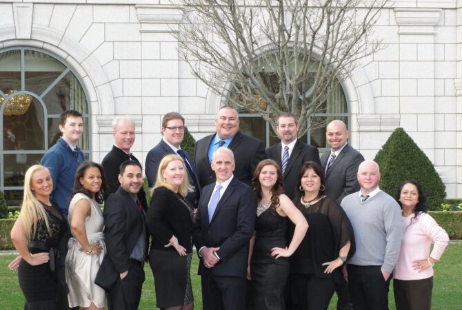 extra space employees standing for photo and award