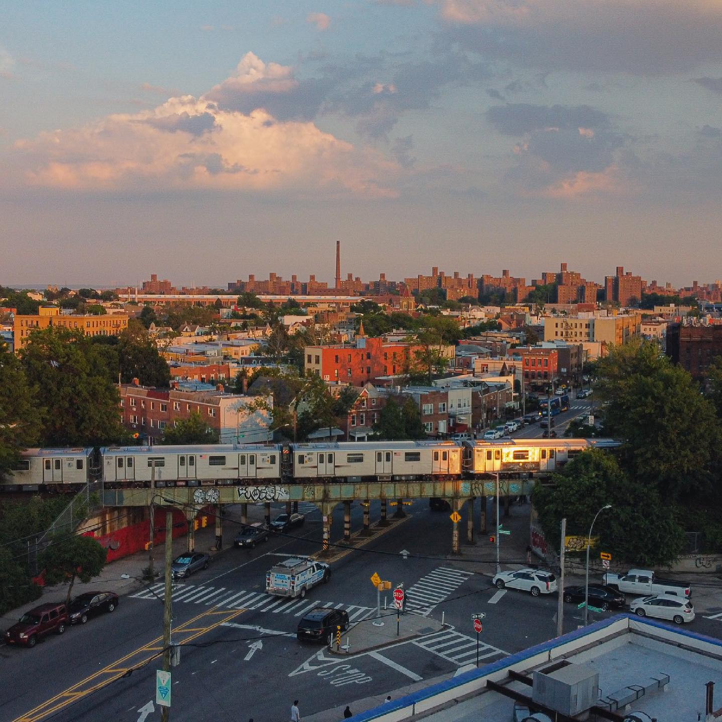 Dusky skyline photo of the Bronx with NYC public transportation. Photo by Instagram user @r.ace.me