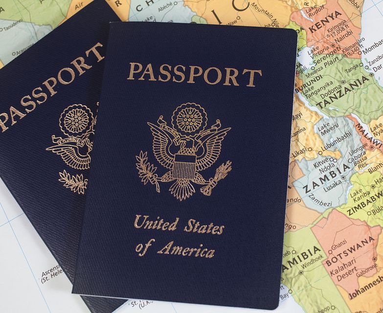 U.S. Passports Sitting on Top of Map. Photo by Instagram user @solana_travel_destinations