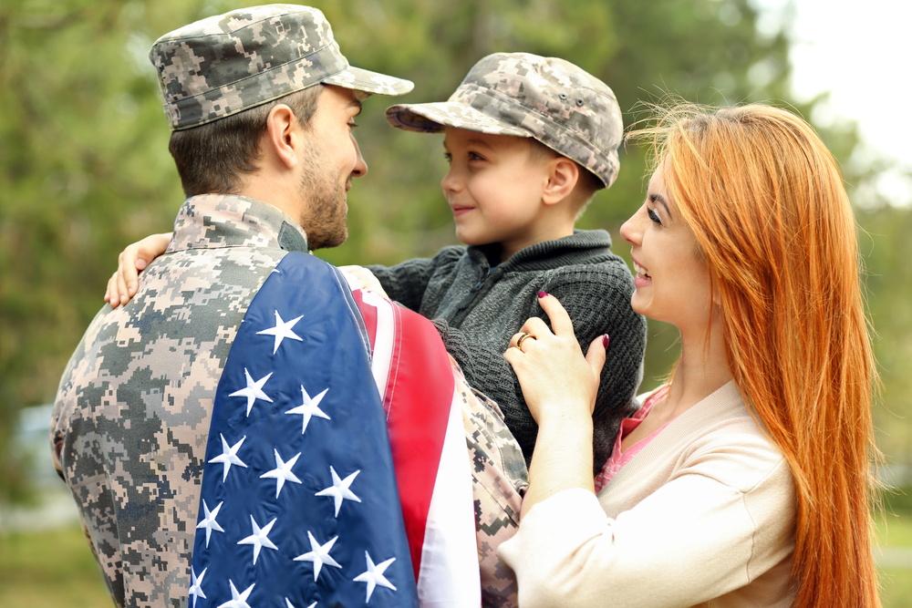 Military servicemember with wife and young son