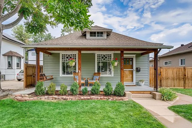 Front view of house in Berkeley neighborhood in Denver. Photo by @florencerealtyco