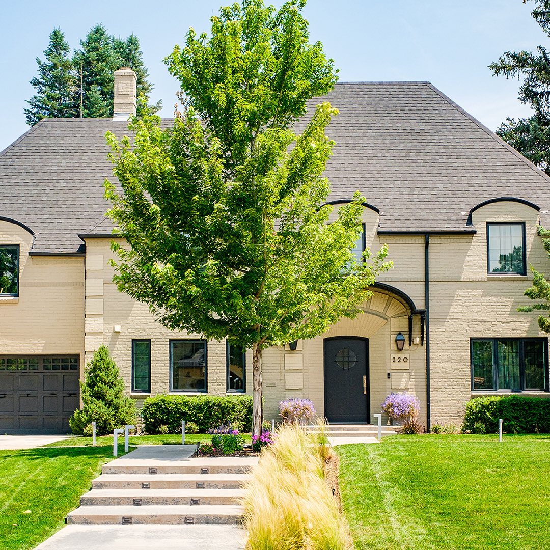 Front view of a house during the day in the Hilltop neighborhood in Denver. Photo by @athomewiththespoors theknollteam