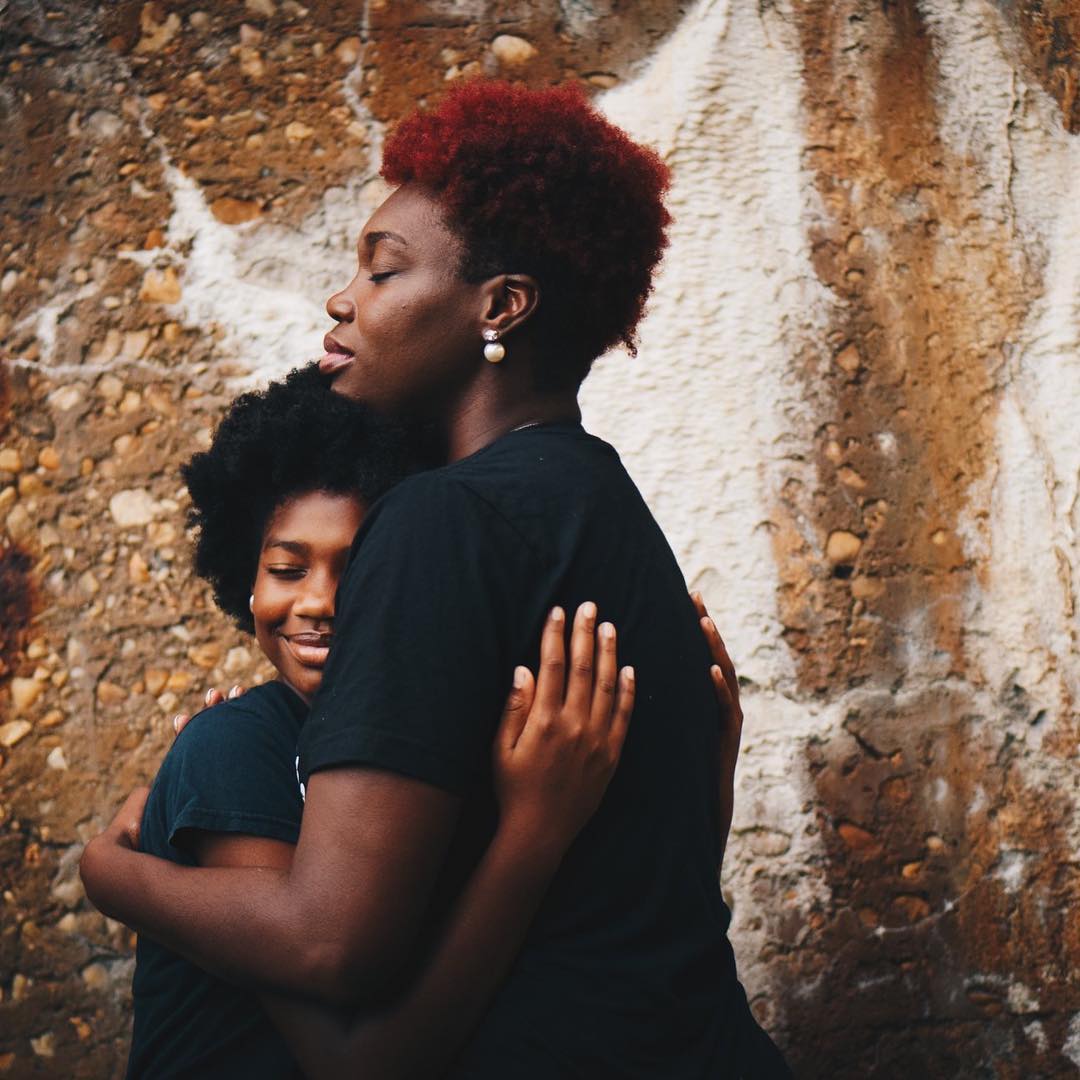 Mom and son hugging. Photo by Instagram user @sarina_elder