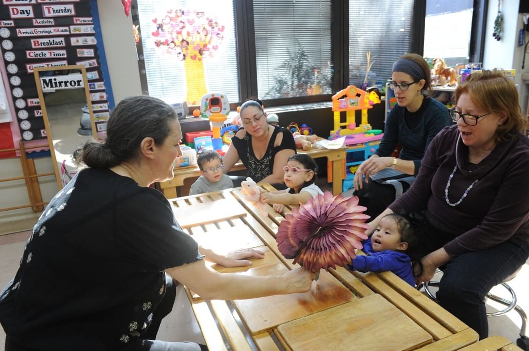 Volunteer Worker Teaching Children with Cerebral Palsy. Photo by Instagram user @adaptwechange