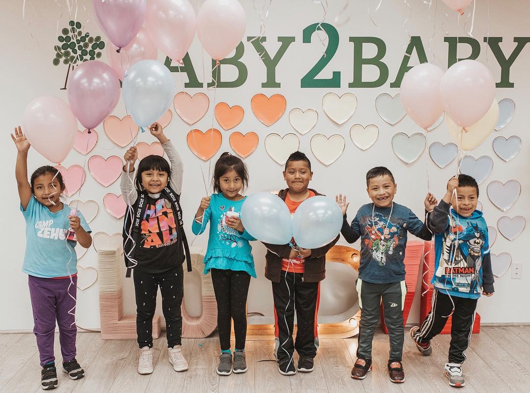 Young Children with Balloons Celebrating at Baby2Baby. Photo by Instagram user @baby2baby