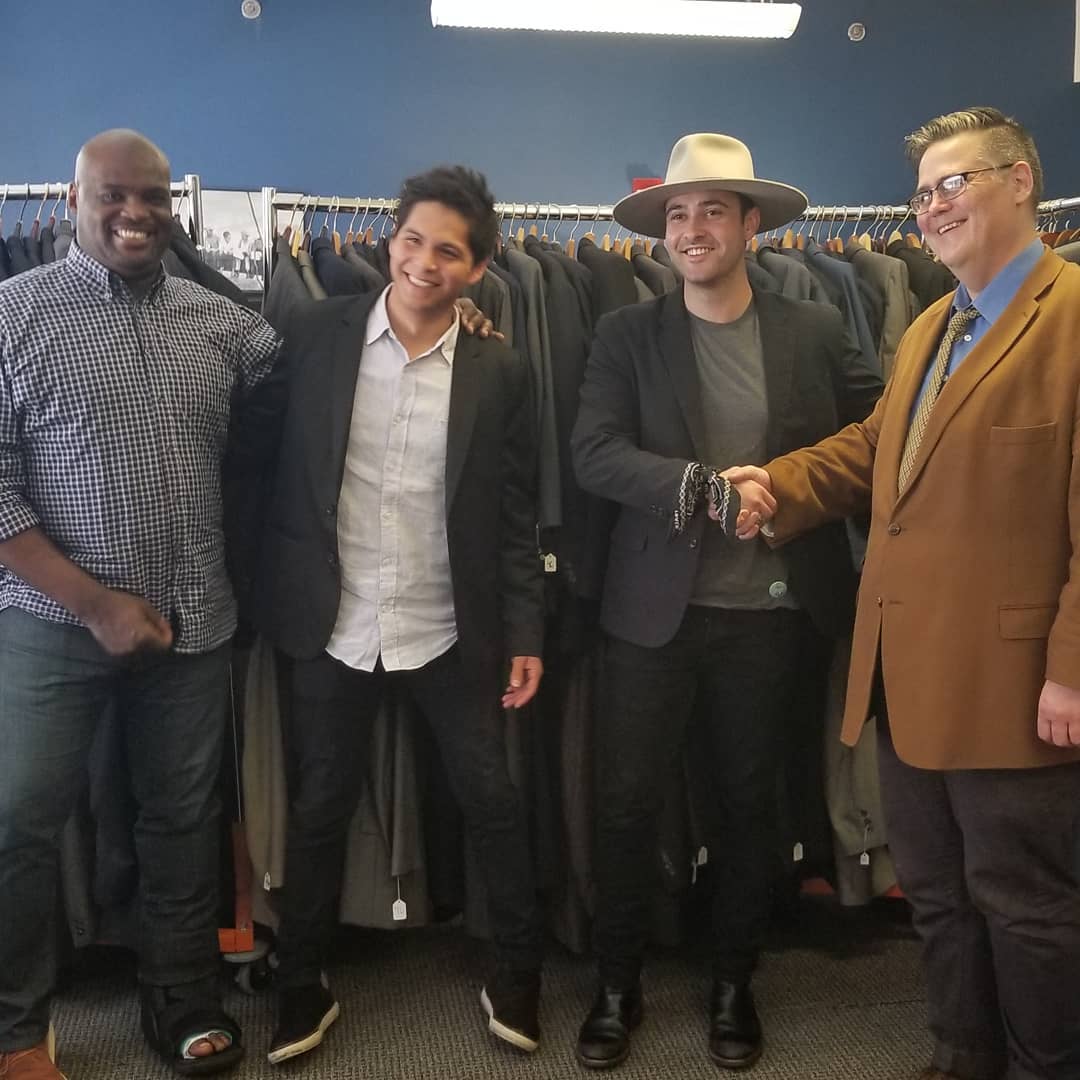Men Buying Clothes off Suit Rack at Career Gear. Photo by Instagram user @careergear