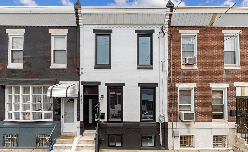 Two story row homes in Bella Vista neighborhood in Philadelphia. Photo via Instagram user @wjhconstruction