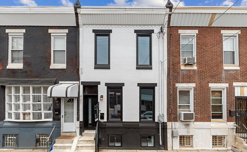 Two story row homes in Bella Vista neighborhood in Philadelphia. Photo via Instagram user @wjhconstruction