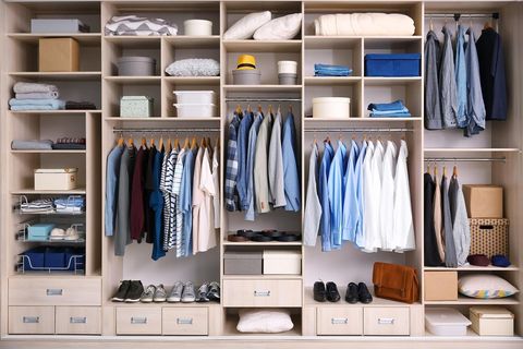 A brown organized closet for shoes and clothes. Photo by Instagram user @mintlyputorganizing