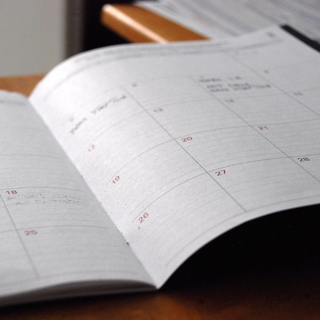 White calendar open on desk. Photo by Instagram user @specialopscleanteam