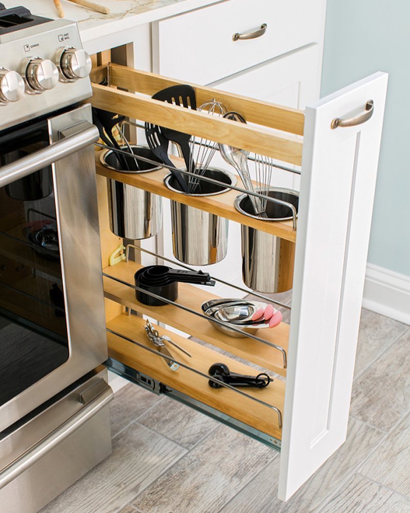 Pullout cabinet next to oven. Photo by Instagram user @paintlineco