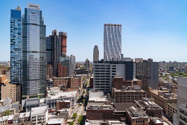 Downtown shot of Long Island skyscrapers at mid-day. Photo by Instagram user @oneboerum