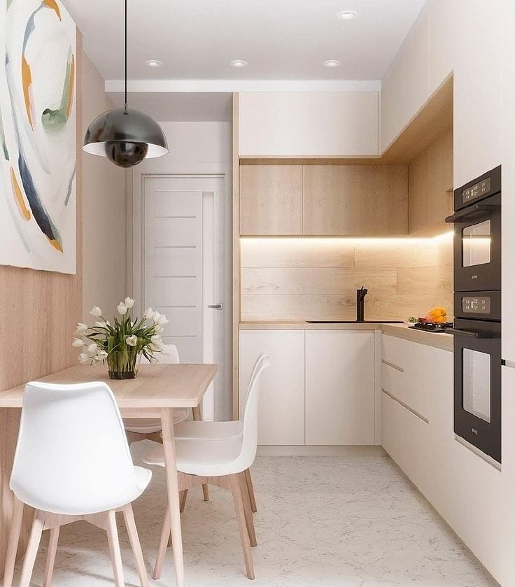 Small apartment kitchen with backlighting and pendant light. Photo by Instagram user @olwood
