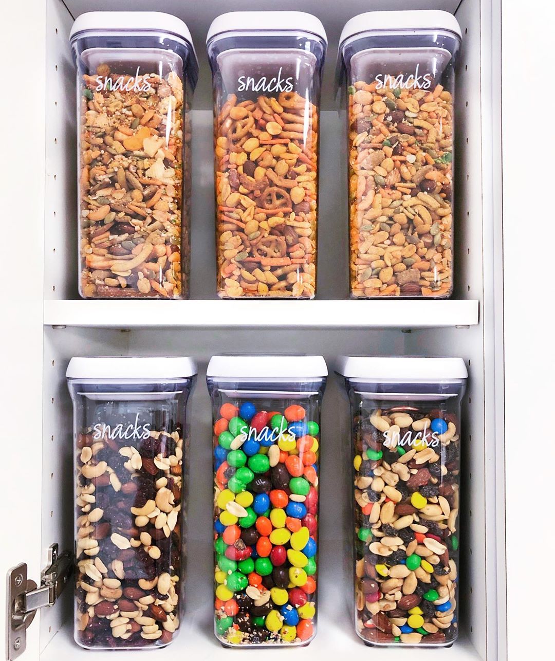 Labeled food storage containers. Photo by Instagram user @thehomeedit