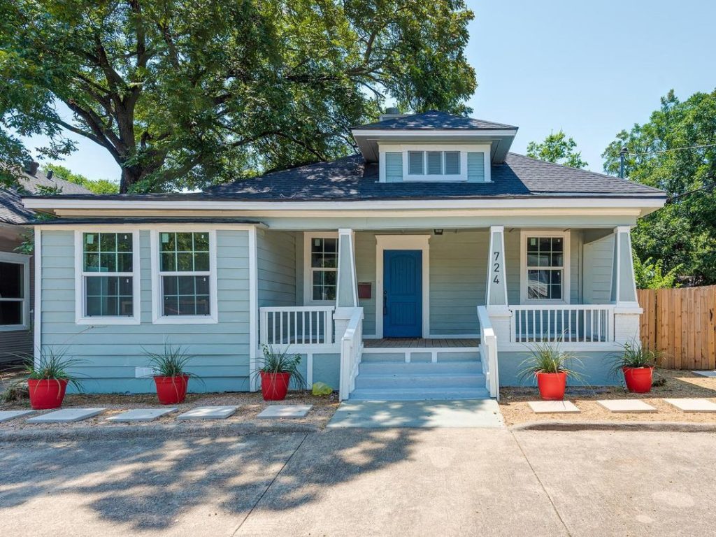 Blue House with White Trim in Bishops Arts District Photo via @thebespokerealtor
