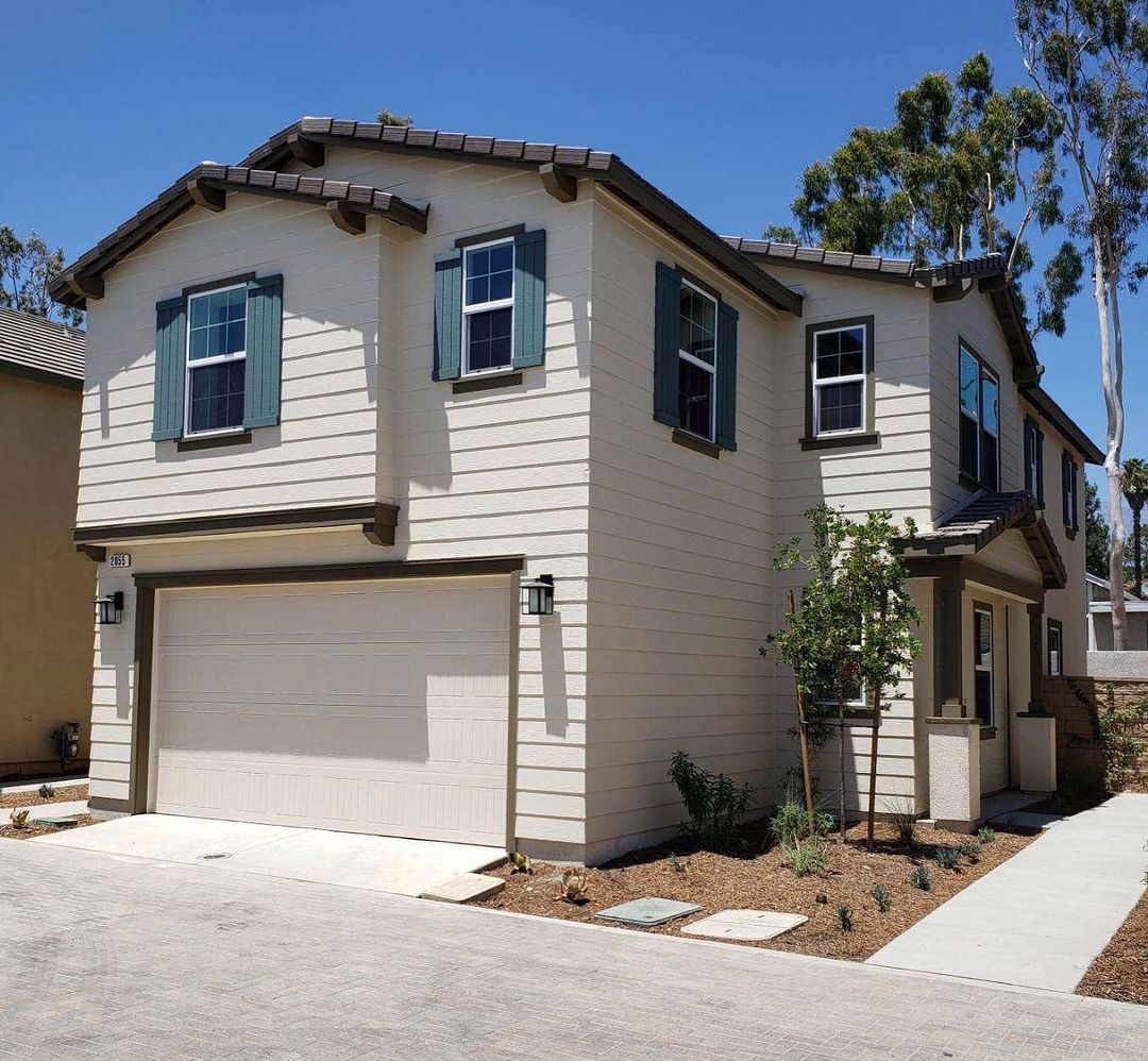 White two-story home in San Bernardino. Photo by Instagram user @kbhomeinlandempire.