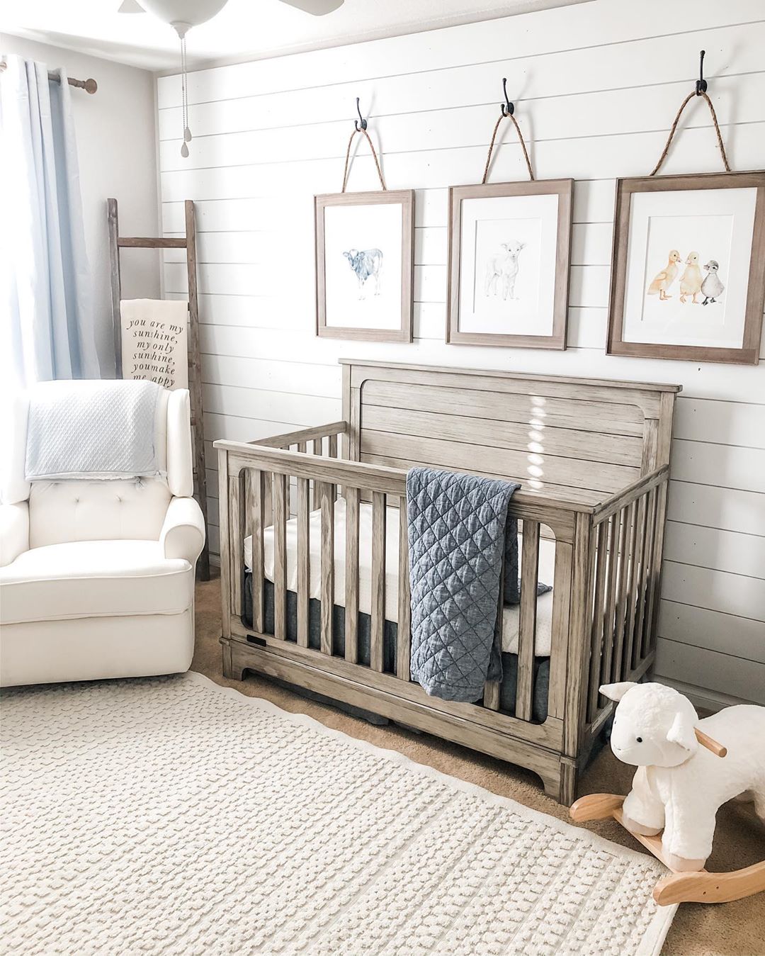 Farmhouse rustic-style baby room. Photo by Instagram user @ashley.l.thompson