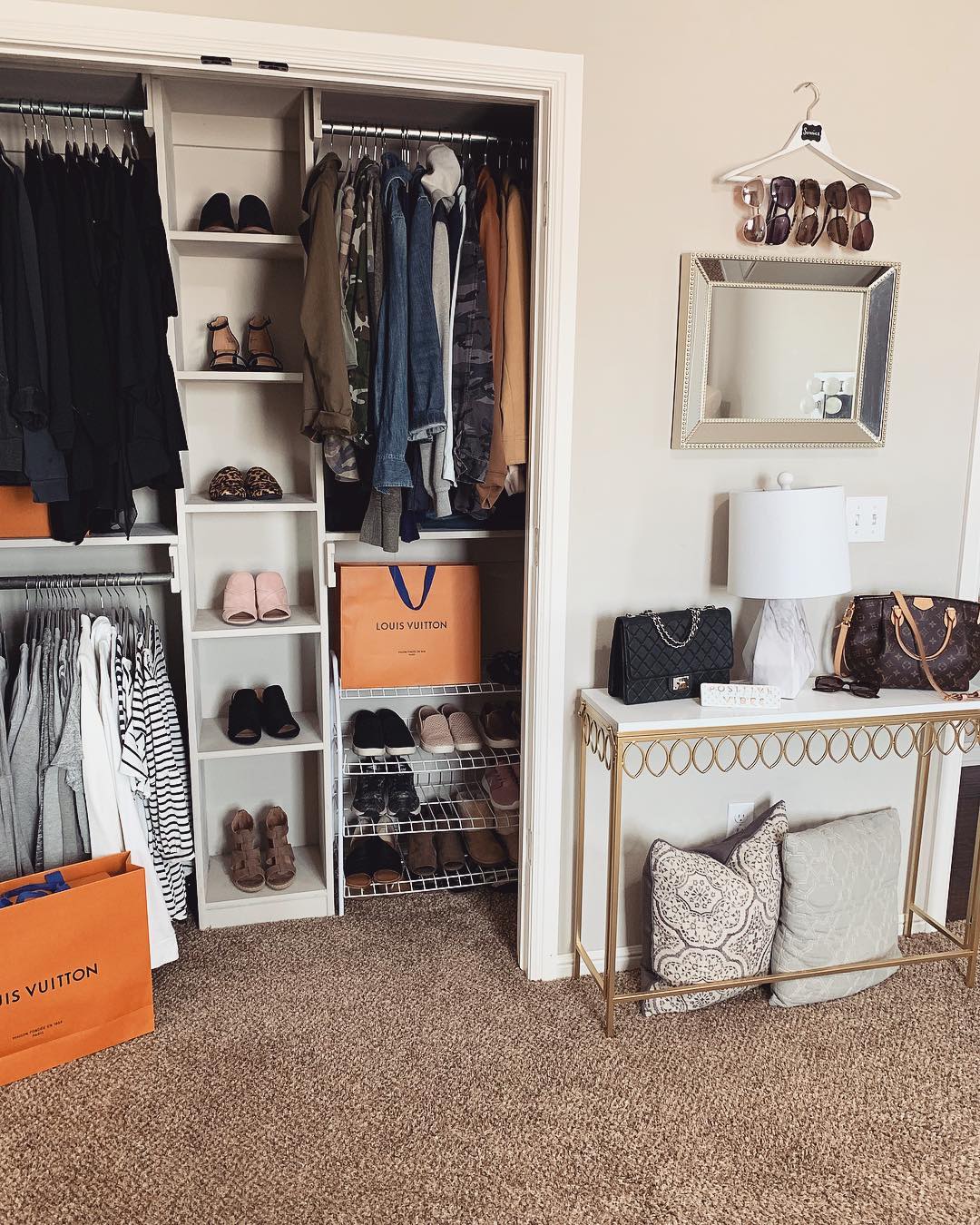 Exposed closet in bedroom. Photo by Instagram @tilvacuumdouspart