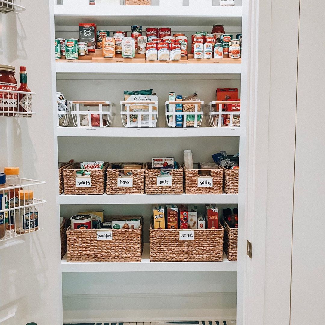 Organized pantry with labeled bins. Photo by Instagram user @organizedlifedesign