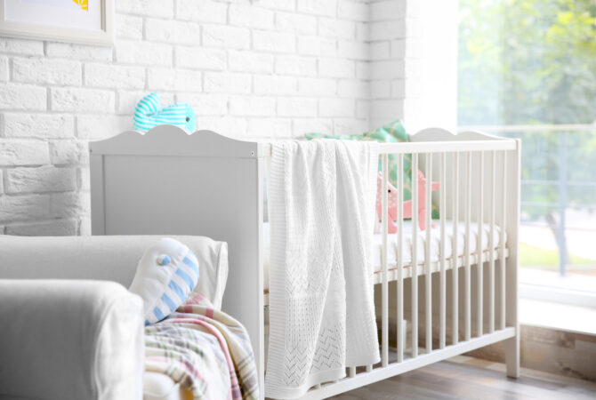 Small apartment nursery with natural lighting