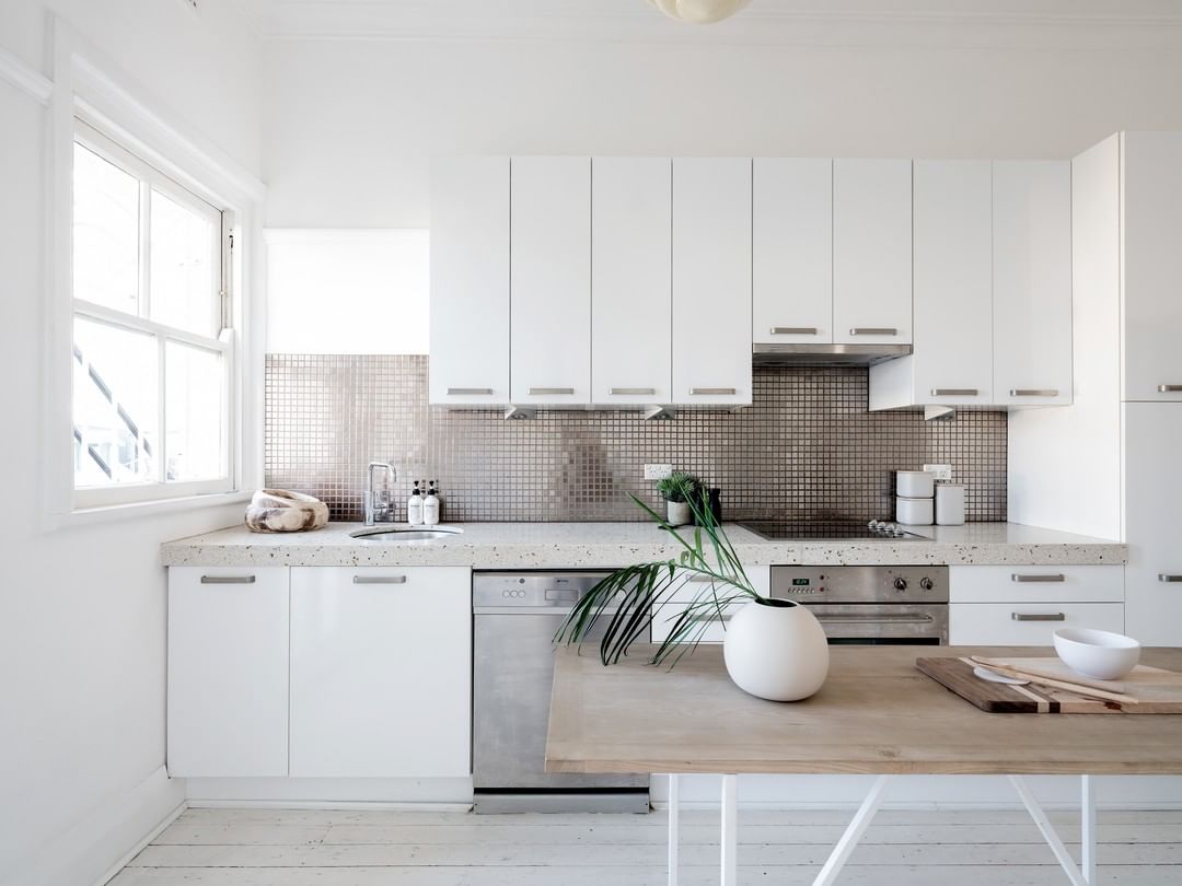 Staged minimalist kitchen. Photo by Instagram user @bellepropertysurryhills