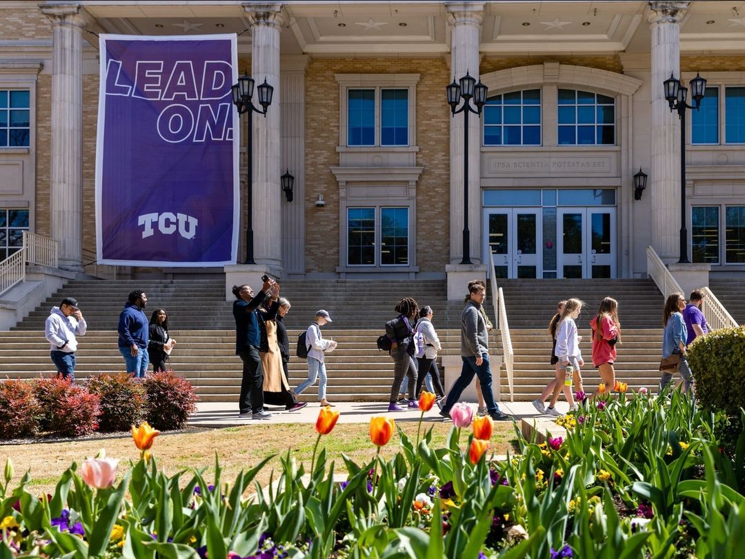 College students walking on Texas Christian University Campus. Photo by Instagram user @texaschristianuniversity