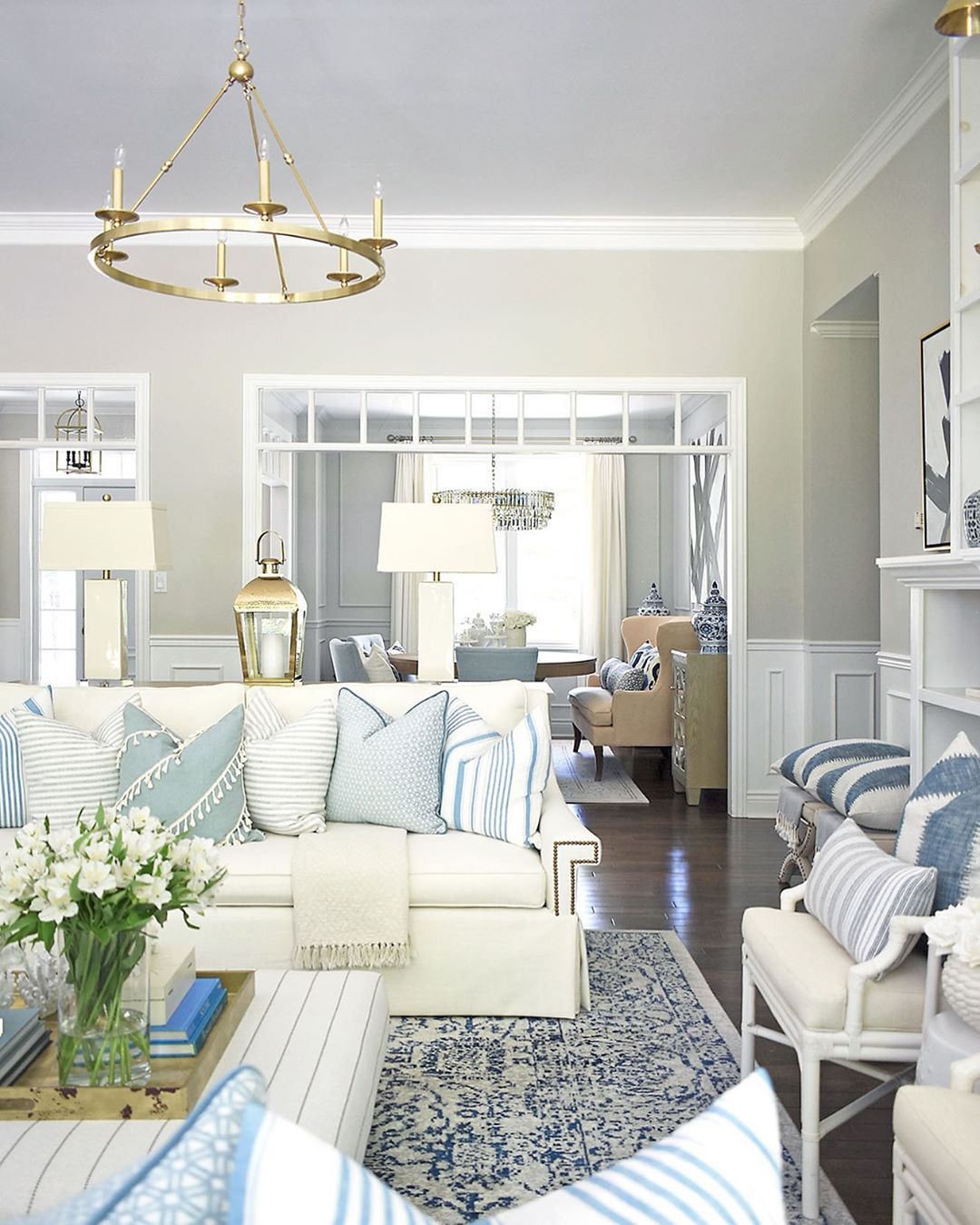 Blue and cream living room, staged home for sale. Photo by Instagram user @citrineliving