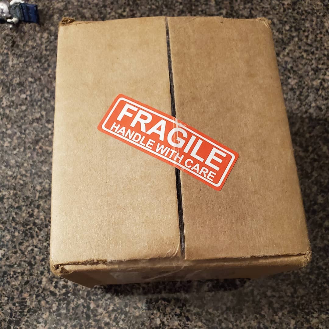 Box with fragile sticker. Photo by Instagram user @crazyoiledmomma2016